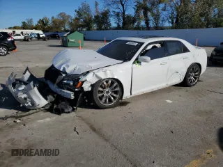 2014 Chrysler 300 S with VIN 2C3CCABT0EH305894, listed as a Copart auction lot 75024404 with 99,018 mi miles and Salvage Title. Bid and sale history available at DreamBid. Image 1.