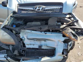 2009 Hyundai Tucson GLS with VIN KM8JM12B29U953176, listed as a Copart auction lot 70141174 with 77,132 mi miles and Salvage Title. Bid and sale history available at carsss.com. Image 13.