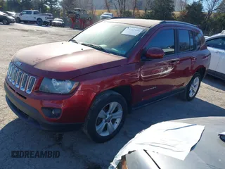 2016 Jeep Compass Latitude with VIN 1C4NJDEB1GD662807, listed as a IAAI auction lot 41161996 with 128,030 mi miles. Bid and sale history available at carsss.com. Image 2.