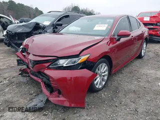 2020 Toyota Camry LE with VIN 4T1C11AK1LU359477, listed as a IAAI auction lot 41800546 with 109,319 mi miles and . Bid and sale history available at DreamBid. Image 18.