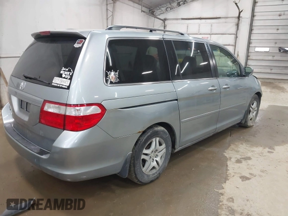2006 Honda Odyssey EX with VIN 5FNRL38446B044231, listed as a IAAI auction lot 42080586 with 211,908 mi miles. Bid and sale history available at carsss.com. Image 4.