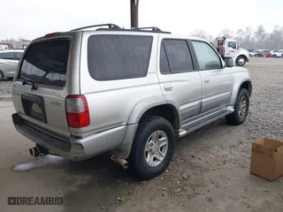 1999 Toyota 4Runner Limited with VIN JT3HN87R4X0215077, listed as a IAAI auction lot 41563450 with 472,388 mi miles. Bid and sale history available at carsss.com. Image 4.