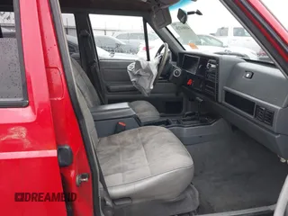 1996 Jeep Cherokee Sport with VIN 1J4FJ68S6TL299152, listed as a IAAI auction lot 41004736 with 277,819 mi miles. Bid and sale history available at carsss.com. Image 5.