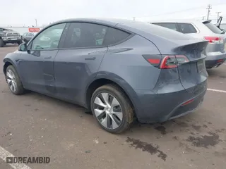 2023 Tesla Model Y Long Range with VIN 7SAYGDEE5PF685301, listed as a IAAI auction lot 41637721 with 30,972 mi miles. Bid and sale history available at carsss.com. Image 3.