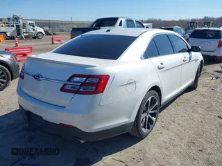 2014 Ford Taurus SEL z VIN 1FAHP2E81EG104137, wystawiony jako IAAI lot #42054432 z przebiegiem 146 046 mil mil oraz . Historia ofert i sprzedaży dostępna na DreamBid. Obrazek 4.