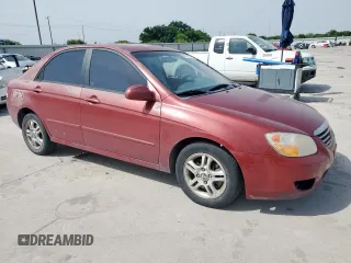 2007 Kia Spectra EX with VIN KNAFE122475378574, listed as a Copart auction lot 56921925 with 142,268 mi miles and Salvage title. Bid and sale history available at DreamBid. Image 4.