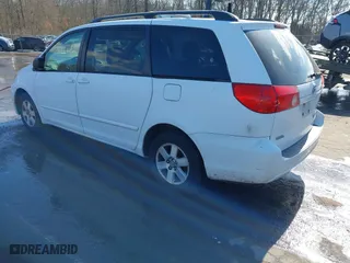 2010 Toyota Sienna CE with VIN 5TDKK4CC0AS329537, listed as a IAAI auction lot 41659723 with 258,226 mi miles. Bid and sale history available at carsss.com. Image 3.