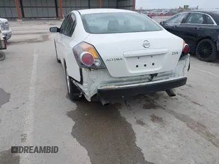2009 Nissan Altima S z VIN 1N4AL21E99N499145, wystawiony jako IAAI lot #41689648 z przebiegiem 171 573 mil mil oraz . Historia ofert i sprzedaży dostępna na DreamBid. Obrazek 18.