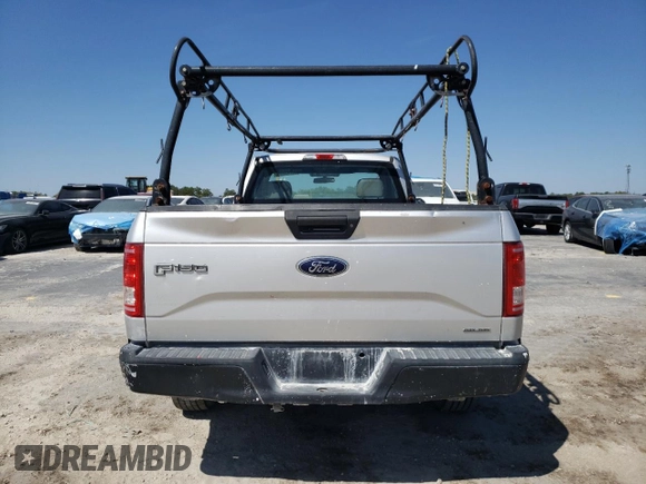 2016 Ford F-150 XL with VIN 1FTMF1C86GKD33700, listed as a Copart auction lot 48743235 with 104,561 mi miles and Salvage title. Bid and sale history available at DreamBid. Image 6.