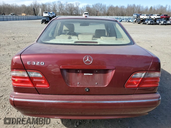 2000 Mercedes-Benz E-Class with VIN WDBJF65J6YB052254, listed as a Copart auction lot 49375555 with 96,015 mi miles and Salvage Title. Bid and sale history available at carsss.com. Image 6.