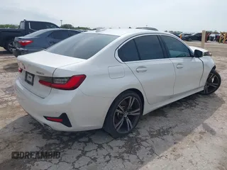 2021 BMW 3 Series 330i with VIN 3MW5R1J09M8C08399, listed as a IAAI auction lot 42483945 with 16,049 mi miles and . Bid and sale history available at DreamBid. Image 4.