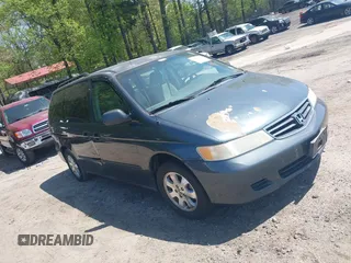 2003 Honda Odyssey EX with VIN 5FNRL18683B132703, listed as a IAAI auction lot 42004982 with Not Provided miles and . Bid and sale history available at carsss.com. Image 1.
