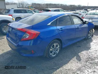 2018 Honda Civic Sedan LX with VIN 19XFC2F53JE019635, listed as a IAAI auction lot 41537152 with 74,958 mi miles. Bid and sale history available at carsss.com. Image 4.