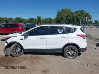 2016 Ford Escape SE with VIN 1FMCU9GX9GUC62462, listed as a IAAI auction lot 39999808 with Not Provided miles. Bid and sale history available at carsss.com. Image 14.
