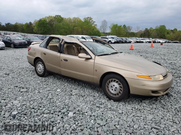 2002 Saturn LS z VIN 1G8JS54F12Y597541, wystawiony jako Copart lot #53327405 z przebiegiem 225 078 mil mil oraz Szkoda całkowita • Salvage title. Historia ofert i sprzedaży dostępna na DreamBid. Obrazek 4.