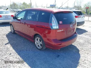 2010 Mazda 5 Sport with VIN JM1CR2WL6A0389227, listed as a IAAI auction lot 42031801 with 100,652 mi miles. Bid and sale history available at carsss.com. Image 3.