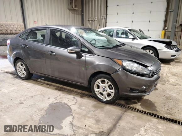 2015 Ford Fiesta SE with VIN 3FADP4BJ5FM123167, listed as a Copart auction lot 52576405 with 104,243 mi miles and Salvage Title. Bid and sale history available at DreamBid. Image 4.