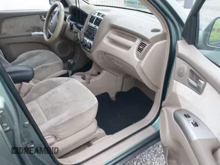 2005 Kia Sportage LX with VIN KNDJF723957038800, listed as a IAAI auction lot 41497596 with 122,189 mi miles and . Bid and sale history available at carsss.com. Image 5.