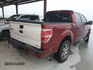 2014 Ford F-150 XL with VIN 1FTFW1CF1EKD58198, listed as a IAAI auction lot 42086106 with 401,943 mi miles. Bid and sale history available at carsss.com. Image 4.