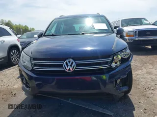 2012 Volkswagen Tiguan S with VIN WVGBV7AX3CW571039, listed as a IAAI auction lot 41928361 with 165,938 mi miles and . Bid and sale history available at DreamBid. Image 12.