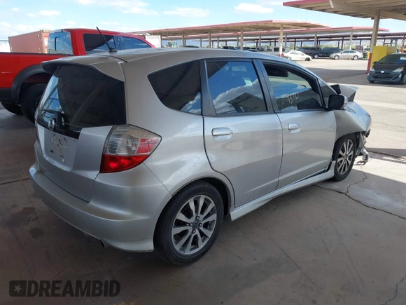 2013 Honda Fit Sport with VIN JHMGE8H54DC047839, listed as a IAAI auction lot 42083683 with 201,284 mi miles. Bid and sale history available at carsss.com. Image 4.