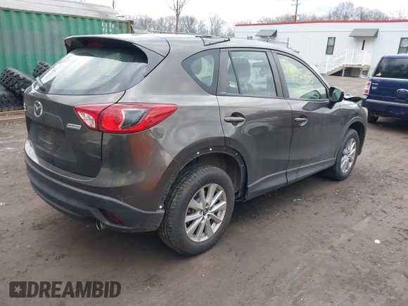 2016 Mazda CX-5 Sport with VIN JM3KE4BY8G0895209, listed as a IAAI auction lot 41688405 with 115,954 mi miles. Bid and sale history available at carsss.com. Image 4.