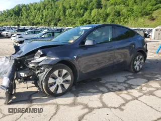 2022 Tesla Model Y Long Range z VIN 7SAYGDEE1NF430383, wystawiony jako Copart lot #56208825 z przebiegiem 60 612 mil mil oraz Szkoda całkowita • Salvage title. Historia ofert i sprzedaży dostępna na DreamBid. Obrazek 1.
