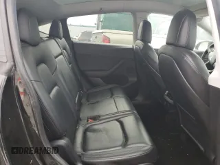 2021 Tesla Model Y Long Range z VIN 5YJYGAEE5MF143672, wystawiony jako Copart lot #55962875 z przebiegiem 74 644 mil mil oraz Szkoda całkowita • Salvage title. Historia ofert i sprzedaży dostępna na DreamBid. Obrazek 11.