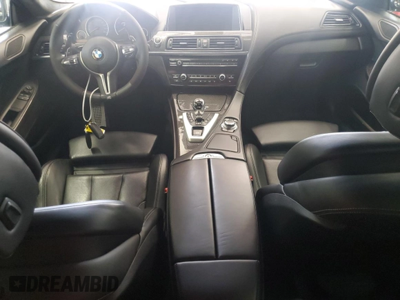 2014 BMW M6 z VIN WBSLX9C58ED160480, wystawiony jako Copart lot #64464985 z przebiegiem 58 514 mil mil oraz Czysty tytuł • Clean title. Historia ofert i sprzedaży dostępna na DreamBid. Obrazek 8.