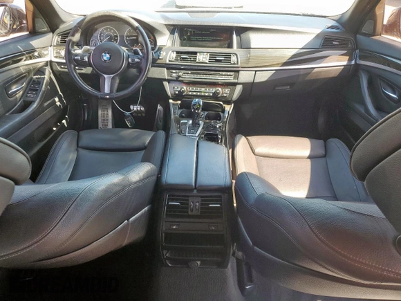 2014 BMW 5 Series 550i z VIN WBAKN9C5XED681268, wystawiony jako Copart lot #55318865 z przebiegiem 89 148 mil mil oraz Szkoda całkowita • Salvage title. Historia ofert i sprzedaży dostępna na DreamBid. Obrazek 8.