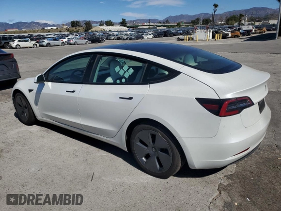 2022 Tesla Model 3 with VIN 5YJ3E1EAXNF203914, listed as a Copart auction lot 46982935 with 70,766 mi miles and Salvage Title. Bid and sale history available at DreamBid. Image 2.