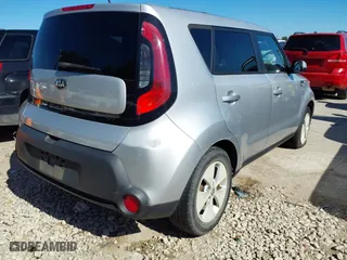 2014 Kia Soul with VIN KNDJN2A22E7722117, listed as a IAAI auction lot 42090386 with 114,695 mi miles. Bid and sale history available at carsss.com. Image 4.
