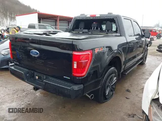 2023 Ford F-150 XL with VIN 1FTFW1E81PFD03857, listed as a IAAI auction lot 41338585 with 9,195 mi miles. Bid and sale history available at carsss.com. Image 4.