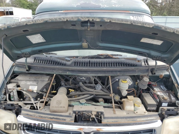 1999 Dodge Cargo Conversion z VIN 2B6HB11Y0XK505623, wystawiony jako Copart lot #71873994 z przebiegiem 69 806 mil mil oraz Nie do naprawy. Historia ofert i sprzedaży dostępna na DreamBid. Obrazek 12.