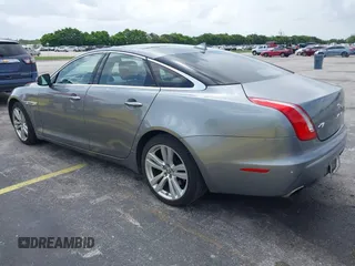 2013 Jaguar XJ with VIN SAJWJ1CD4D8V46305, listed as a IAAI auction lot 42637329 with 101,532 mi miles and . Bid and sale history available at DreamBid. Image 3.