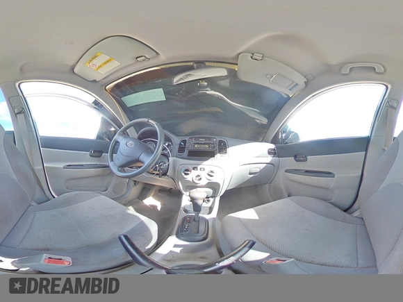 2007 Hyundai Accent GL z VIN KMHCN45C77U073194, wystawiony jako Copart lot #42955445 z przebiegiem 248 364 mil mil oraz Nie do naprawy • Non repairable. Historia ofert i sprzedaży dostępna na DreamBid. Obrazek 13.