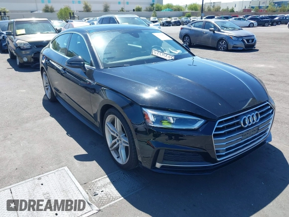 2018 Audi A5 Sportback Premium Plus z VIN WAUENCF55JA009202, wystawiony jako IAAI lot #42218463 z przebiegiem 51 866 mil mil oraz . Historia ofert i sprzedaży dostępna na DreamBid. Obrazek 1.