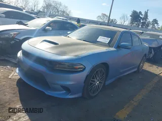 2019 Dodge Charger Scat Pack with VIN 2C3CDXGJ0KH613053, listed as a IAAI auction lot 41908658 with 85,000 mi miles and . Bid and sale history available at DreamBid. Image 17.