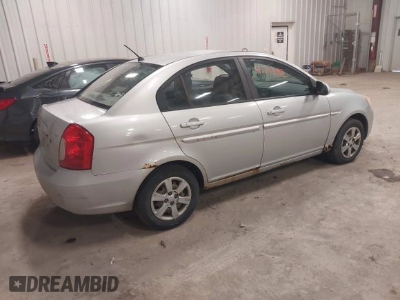 2006 Hyundai Accent GLS with VIN KMHCN46C06U004764, listed as a IAAI auction lot 41793192 with 182,841 mi miles. Bid and sale history available at carsss.com. Image 4.