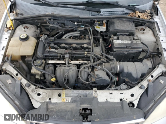 2007 Ford Focus S z VIN 1FAFP34N97W236303, wystawiony jako Copart lot #55248765 z przebiegiem 125 900 mil mil oraz Szkoda całkowita • Salvage title. Historia ofert i sprzedaży dostępna na DreamBid. Obrazek 11.