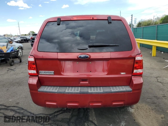 2012 Ford Escape XLS with VIN 1FMCU9C71CKB13734, listed as a Copart auction lot 55331865 with 182,323 mi miles and Salvage title. Bid and sale history available at DreamBid. Image 6.