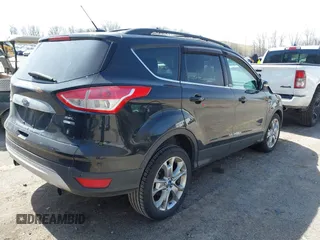 2013 Ford Escape SEL with VIN 1FMCU9H9XDUA01207, listed as a IAAI auction lot 41937971 with Not provided miles and . Bid and sale history available at DreamBid. Image 4.