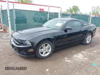 2014 Ford Mustang V6 with VIN 1ZVBP8AM5E5226188, listed as a IAAI auction lot 42181615 with 70,748 mi miles and . Bid and sale history available at carsss.com. Image 20.