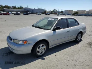 2000 Toyota Corolla VE with VIN 1NXBR18E2YZ399210, listed as a Copart auction lot 62413085 with 305,367 mi miles and Salvage title. Bid and sale history available at DreamBid. Image 1.