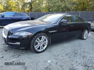 2016 Jaguar XJ Portfolio with VIN SAJWJ2GD5G8W02952, listed as a Copart auction lot 75216074 with 98,766 mi miles and Clean Title. Bid and sale history available at DreamBid. Image 1.