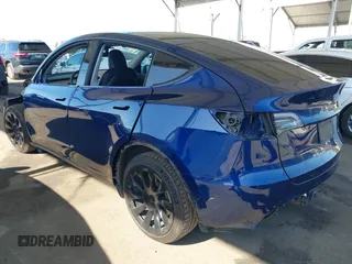 2021 Tesla Model Y Long Range z VIN 5YJYGDEE1MF296454, wystawiony jako IAAI lot #42233096 z przebiegiem 48 125 mil mil oraz . Historia ofert i sprzedaży dostępna na DreamBid. Obrazek 3.
