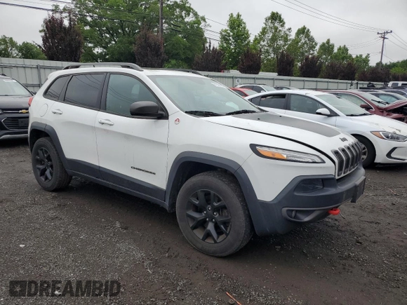 2015 Jeep Cherokee Trailhawk with VIN 1C4PJMBS6FW680963, listed as a Copart auction lot 61306385 with 174,793 mi miles and Clean title. Bid and sale history available at DreamBid. Image 4.
