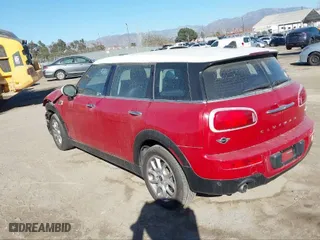 2016 MINI Cooper Clubman with VIN WMWLN5C51G2E30234, listed as a IAAI auction lot 41408299 with 81,895 mi miles. Bid and sale history available at carsss.com. Image 3.