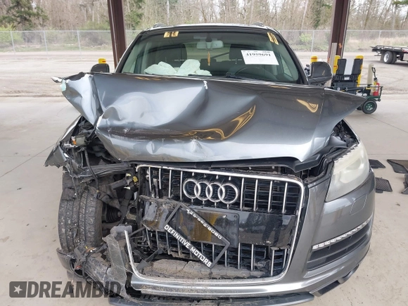 2014 Audi Q7 3.0L TDI Premium with VIN WA1CMAFE7ED017740, listed as a IAAI auction lot 41959691 with 112,521 mi miles. Bid and sale history available at carsss.com. Image 6.