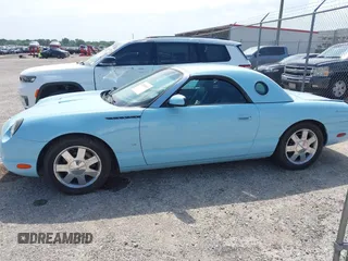 2003 Ford Thunderbird Deluxe z VIN 1FAHP60A53Y101461, wystawiony jako IAAI lot #42519933 z przebiegiem 64 820 mil mil oraz . Historia ofert i sprzedaży dostępna na DreamBid. Obrazek 14.